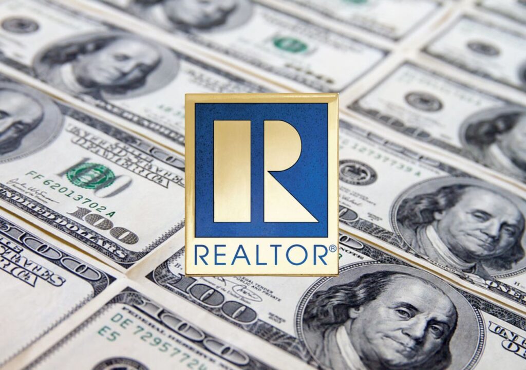 The National Association of Realtors (NAR) logo centered on a background of 100 dollar bills.